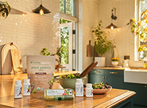 Nutrilite protein booster sits on a kitchen counter.